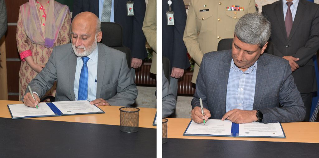 Figure 1: Dr. Rizwan Riaz, Pro Rector (RIC) and Dr. Numan Iqbal, Head of Resolve signing DoU